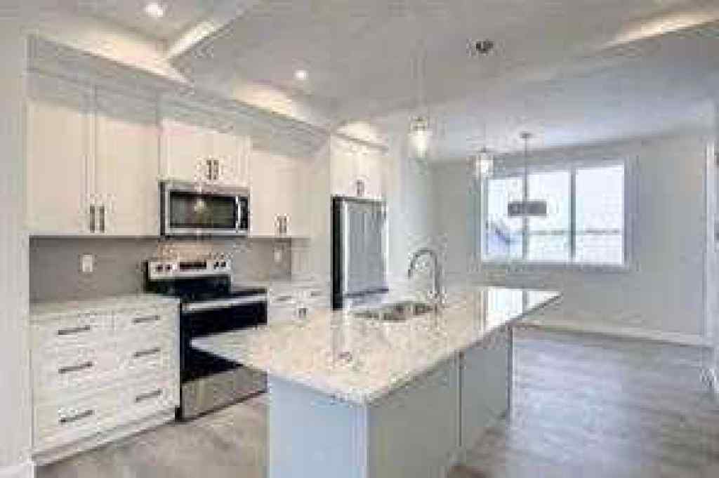 MLS® A2252055 - 63 Lambeau Lane SE in Lanark Airdrie, Residential
