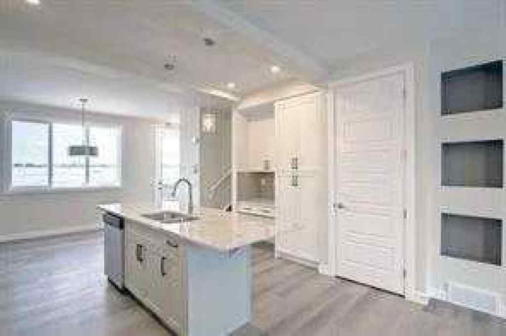 MLS® A2252055 - 63 Lambeau Lane SE in Lanark Airdrie, Residential
