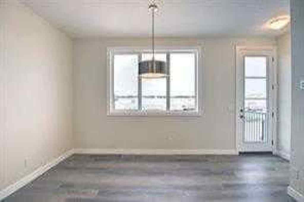 MLS® A2252055 - 63 Lambeau Lane SE in Lanark Airdrie, Residential