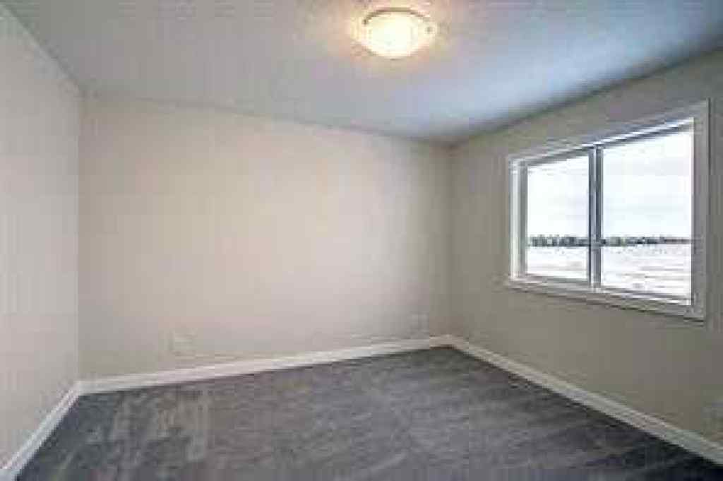MLS® A2252055 - 63 Lambeau Lane SE in Lanark Airdrie, Residential