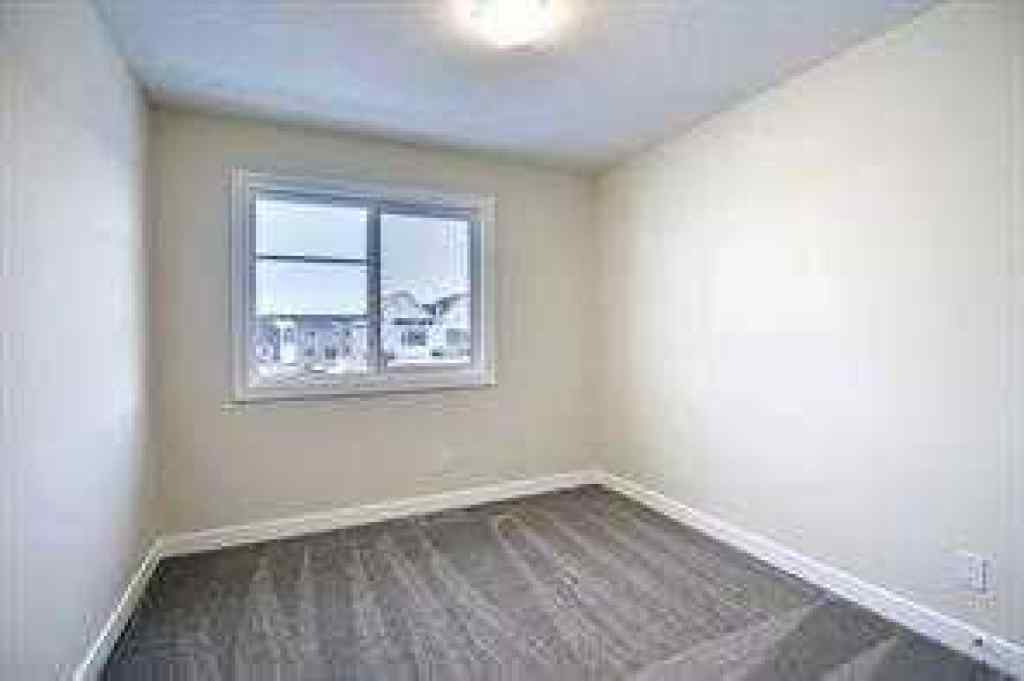 MLS® A2252055 - 63 Lambeau Lane SE in Lanark Airdrie, Residential