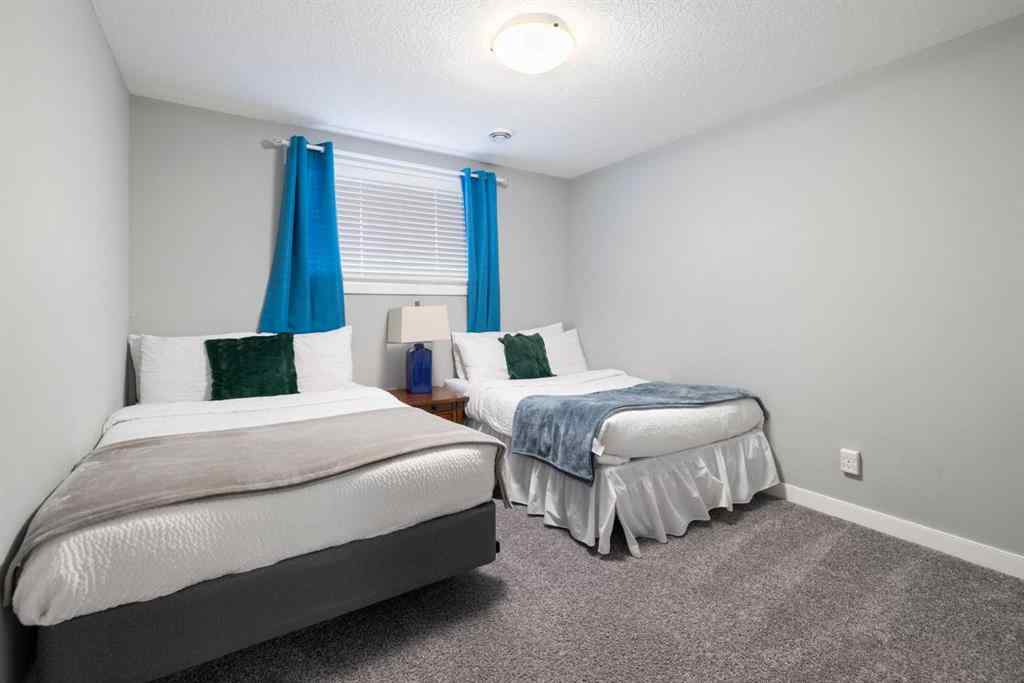 MLS® A2252106 - 218 Willow Place  in The Willows Cochrane, Residential