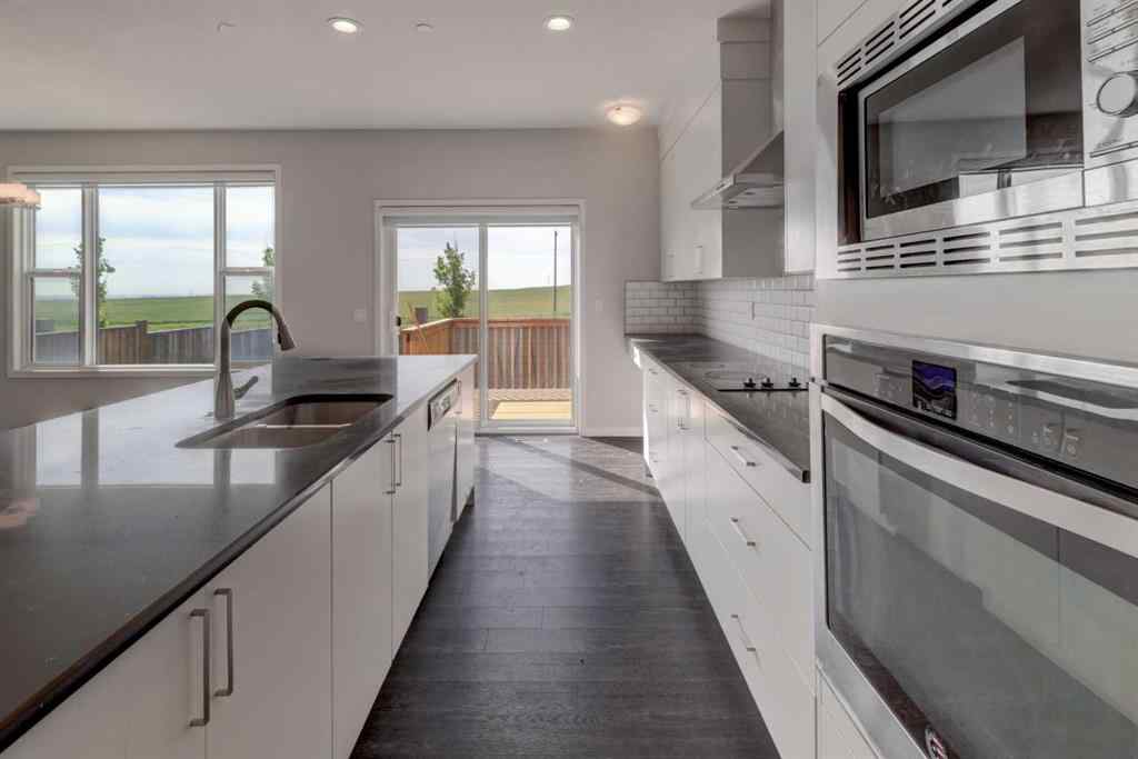 MLS® A2252113 - 70 Howse Common NE in Livingston Calgary, Residential
