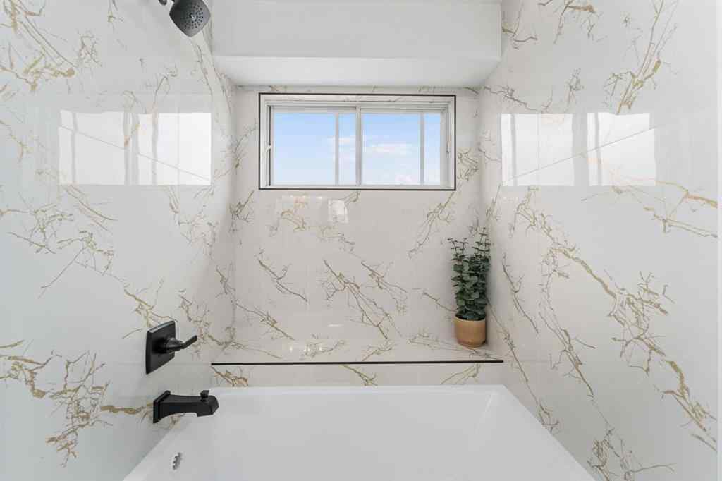 MLS® A2252125 - 395 Millrise Drive SW in Millrise Calgary, Residential