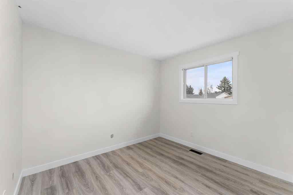 MLS® A2252125 - 395 Millrise Drive SW in Millrise Calgary, Residential