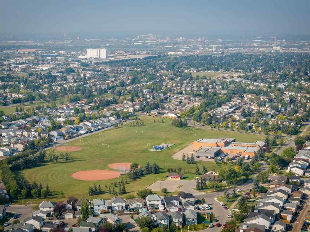 MLS® A2252138 - 23 Erin Grove Court SE in Erin Woods Calgary, Residential