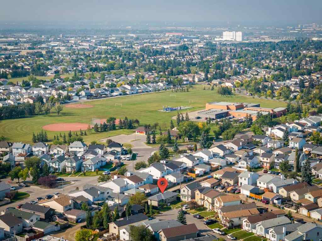MLS® A2252138 - 23 Erin Grove Court SE in Erin Woods Calgary, Residential