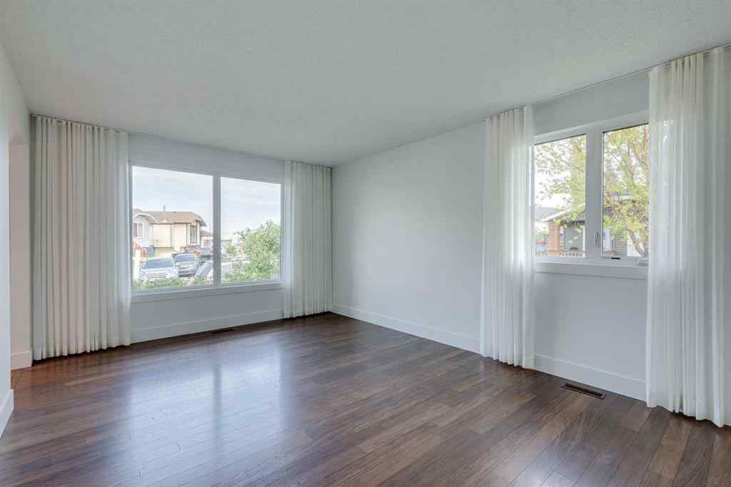 MLS® A2252138 - 23 Erin Grove Court SE in Erin Woods Calgary, Residential