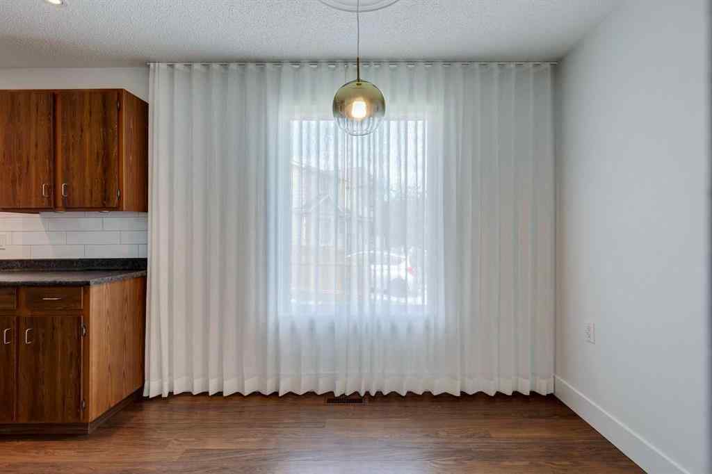 MLS® A2252138 - 23 Erin Grove Court SE in Erin Woods Calgary, Residential