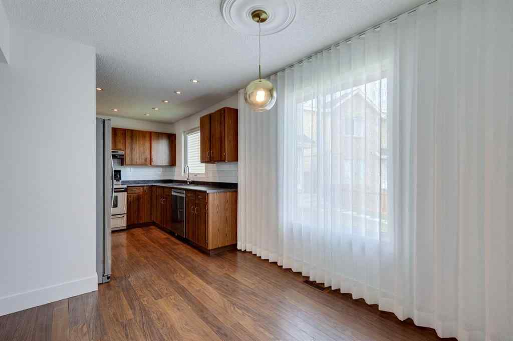 MLS® A2252138 - 23 Erin Grove Court SE in Erin Woods Calgary, Residential
