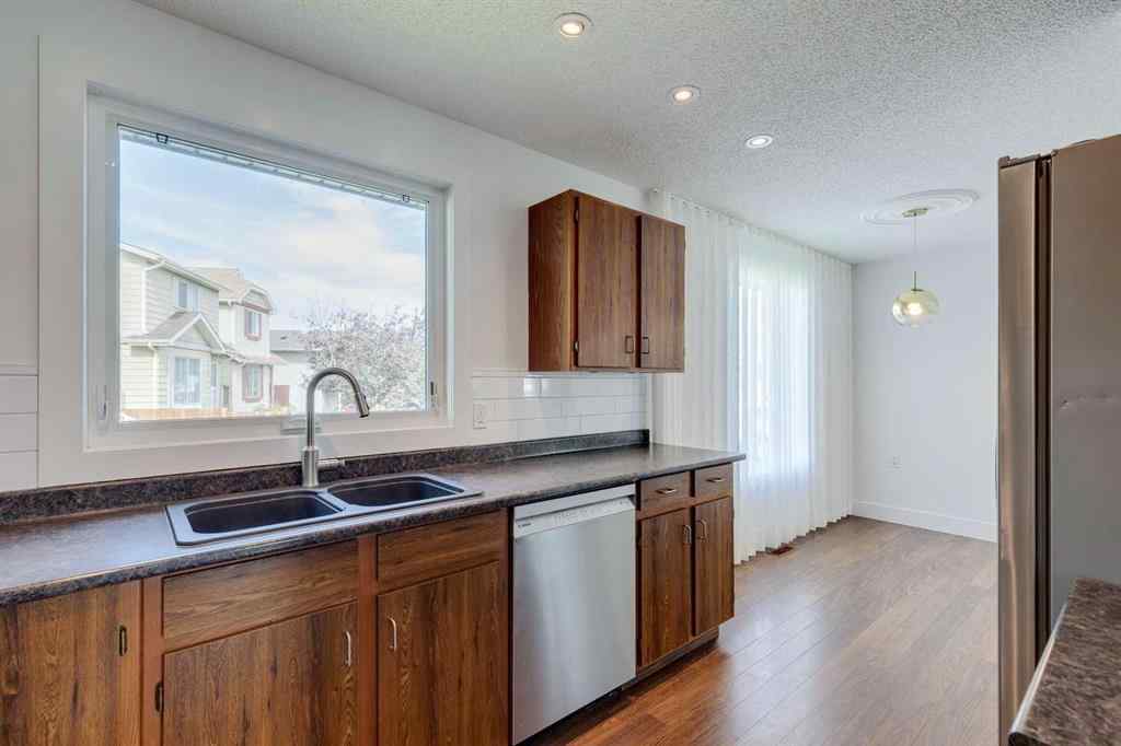 MLS® A2252138 - 23 Erin Grove Court SE in Erin Woods Calgary, Residential