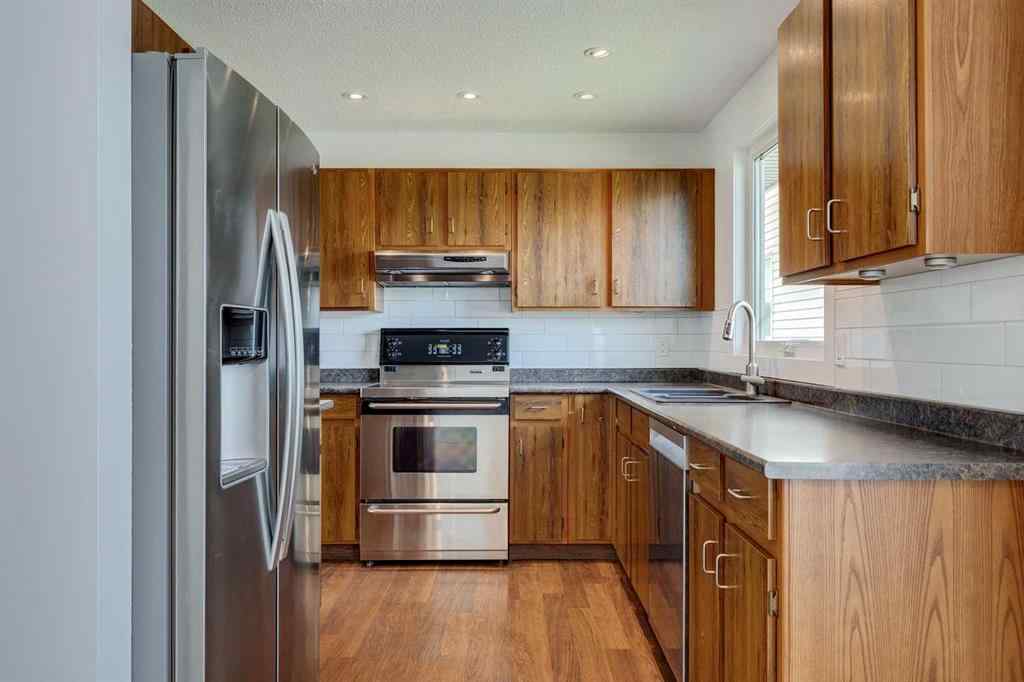 MLS® A2252138 - 23 Erin Grove Court SE in Erin Woods Calgary, Residential