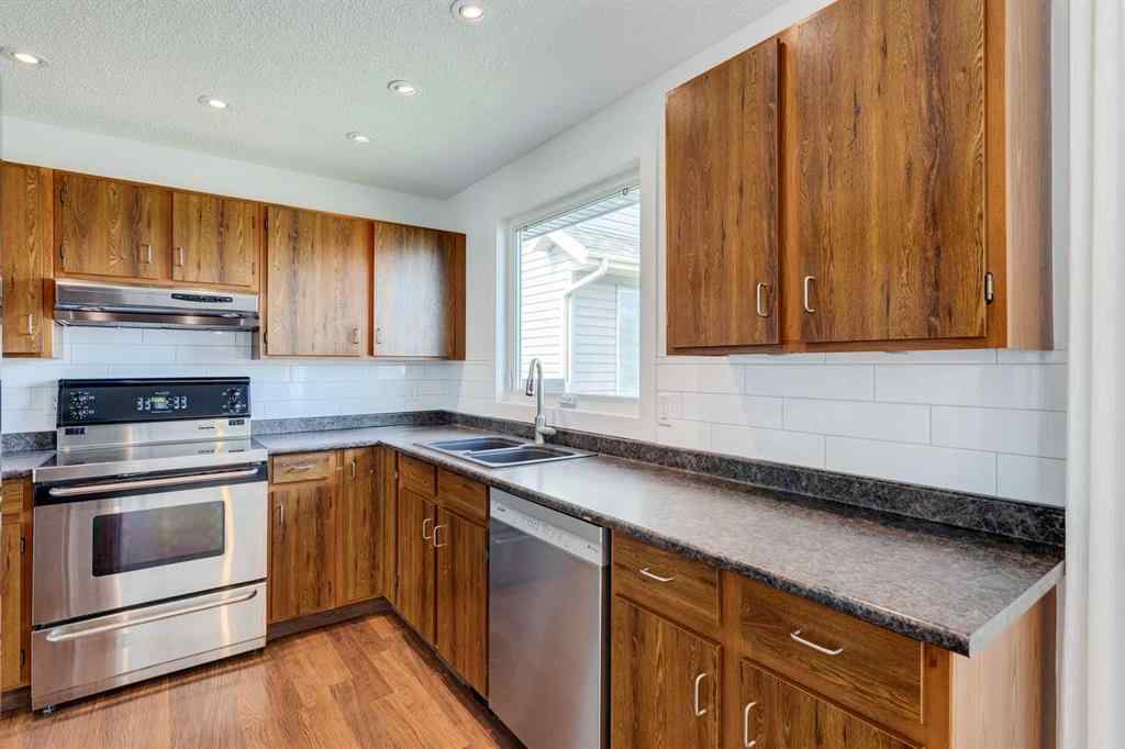 MLS® A2252138 - 23 Erin Grove Court SE in Erin Woods Calgary, Residential