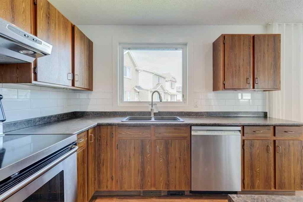 MLS® A2252138 - 23 Erin Grove Court SE in Erin Woods Calgary, Residential