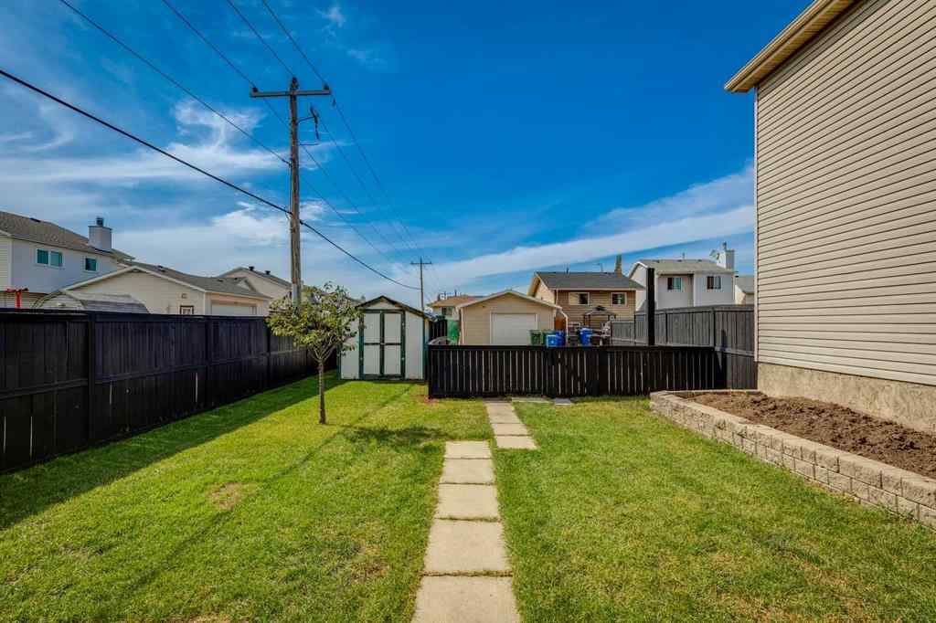 MLS® A2252138 - 23 Erin Grove Court SE in Erin Woods Calgary, Residential