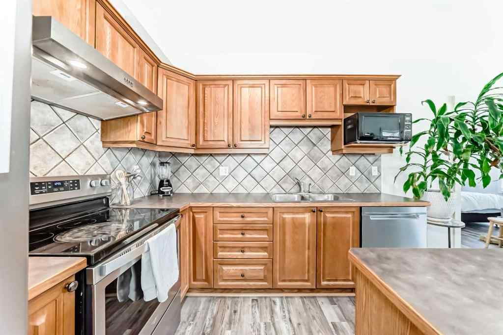 MLS® A2252147 - Unit #406 8000 Wentworth Drive SW in West Springs Calgary, Residential