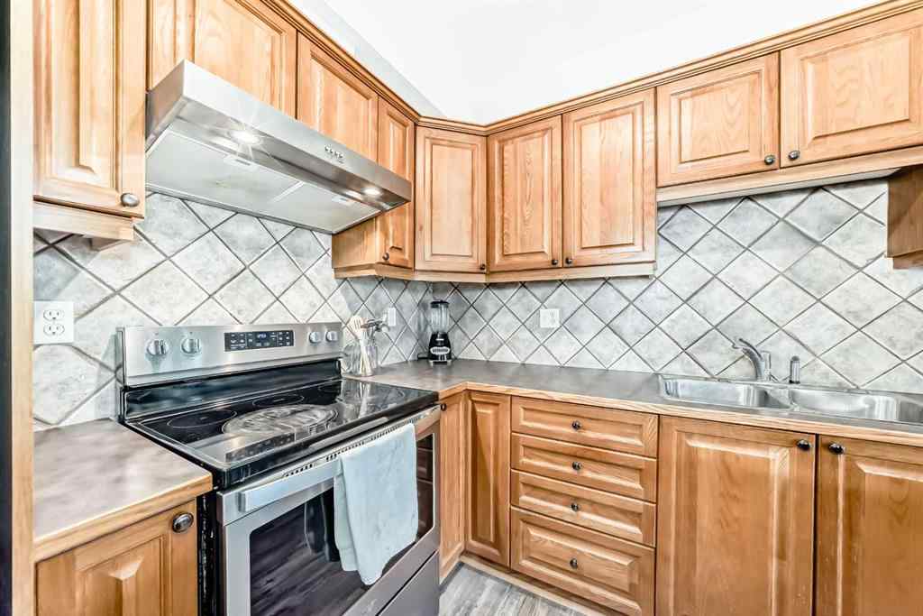 MLS® A2252147 - Unit #406 8000 Wentworth Drive SW in West Springs Calgary, Residential