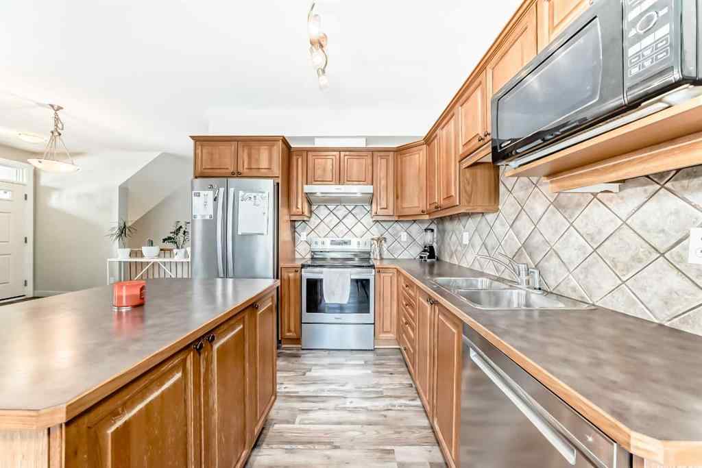 MLS® A2252147 - Unit #406 8000 Wentworth Drive SW in West Springs Calgary, Residential