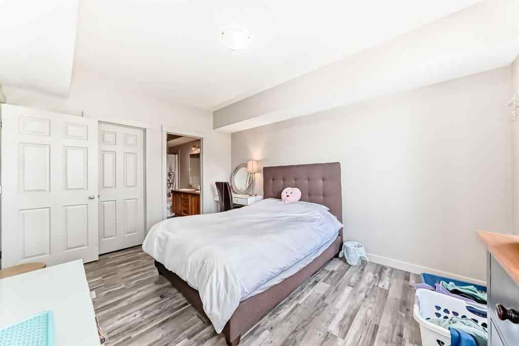 MLS® A2252147 - Unit #406 8000 Wentworth Drive SW in West Springs Calgary, Residential