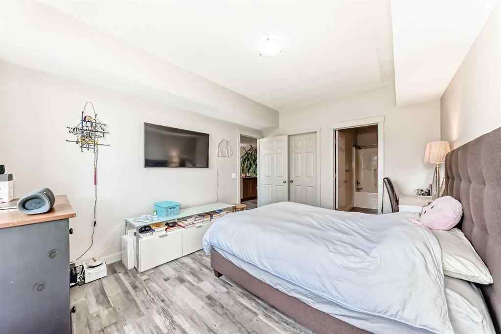 MLS® A2252147 - Unit #406 8000 Wentworth Drive SW in West Springs Calgary, Residential