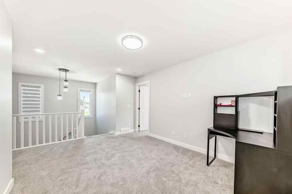 MLS® A2252153 - 857 Midtown Drive SW in Midtown Airdrie, Residential