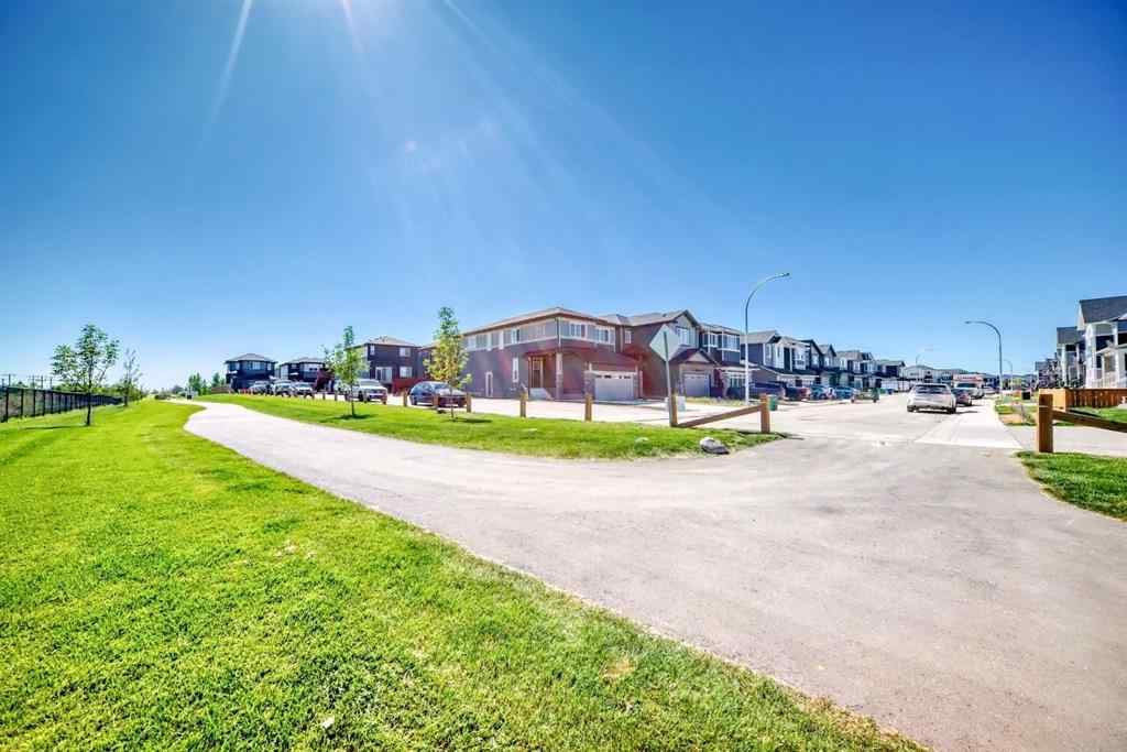 MLS® A2252153 - 857 Midtown Drive SW in Midtown Airdrie, Residential