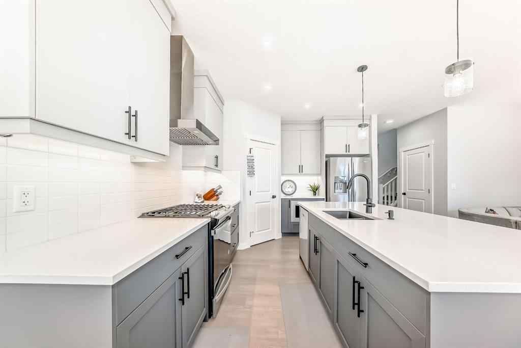 MLS® A2252153 - 857 Midtown Drive SW in Midtown Airdrie, Residential