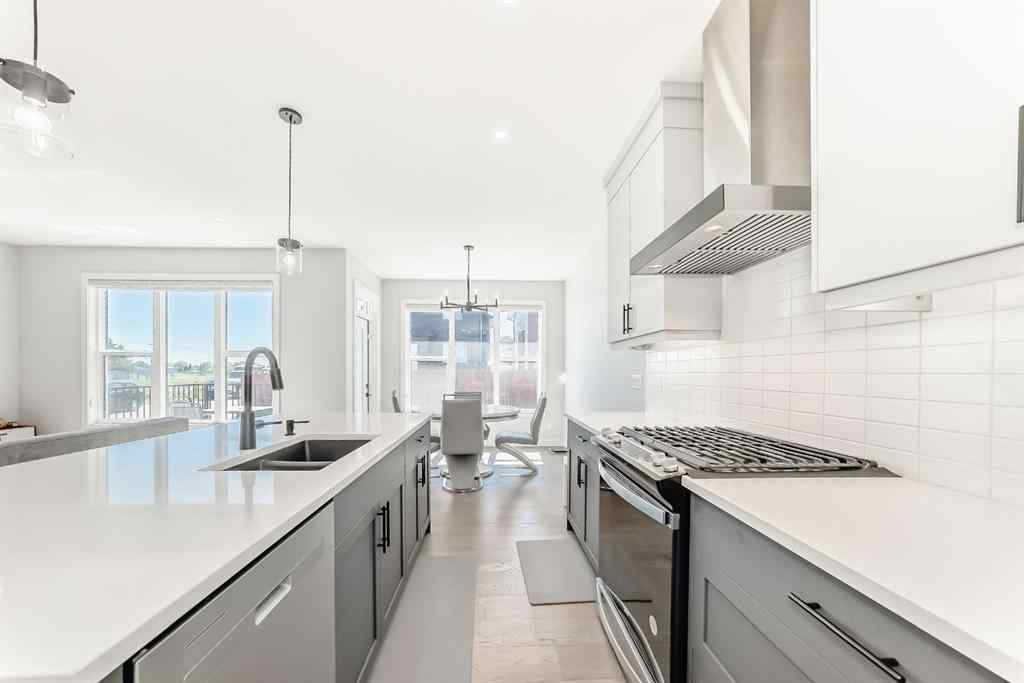 MLS® A2252153 - 857 Midtown Drive SW in Midtown Airdrie, Residential