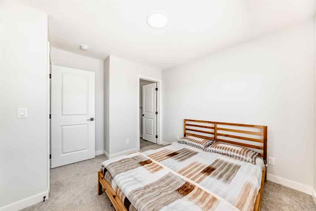 MLS® A2252153 - 857 Midtown Drive SW in Midtown Airdrie, Residential