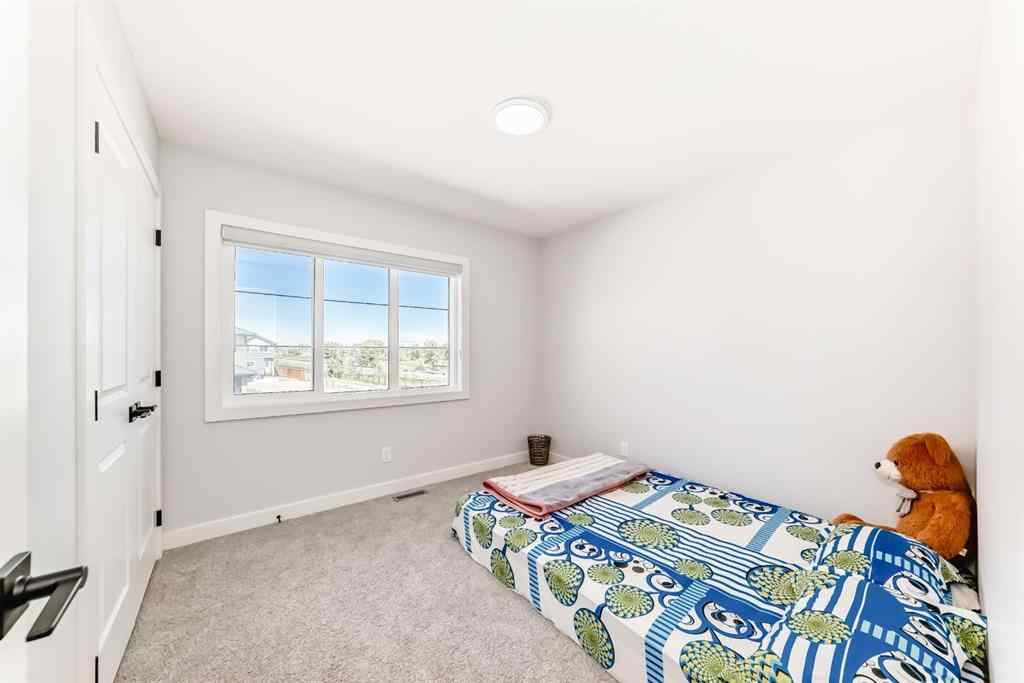 MLS® A2252153 - 857 Midtown Drive SW in Midtown Airdrie, Residential