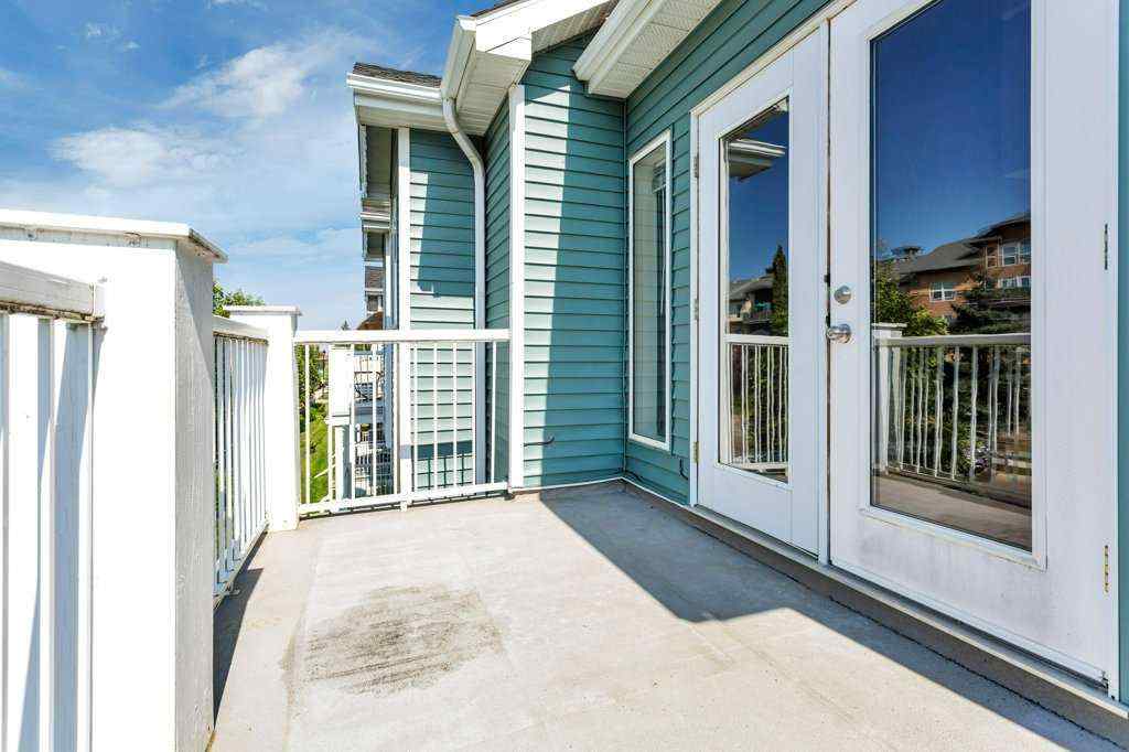 MLS® A2252159 - Unit #201 5220 50A Avenue  in Downtown Sylvan Lake, Residential