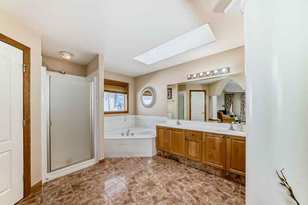 MLS® A2252175 - 42 West Cedar Point SW in West Springs Calgary, Residential