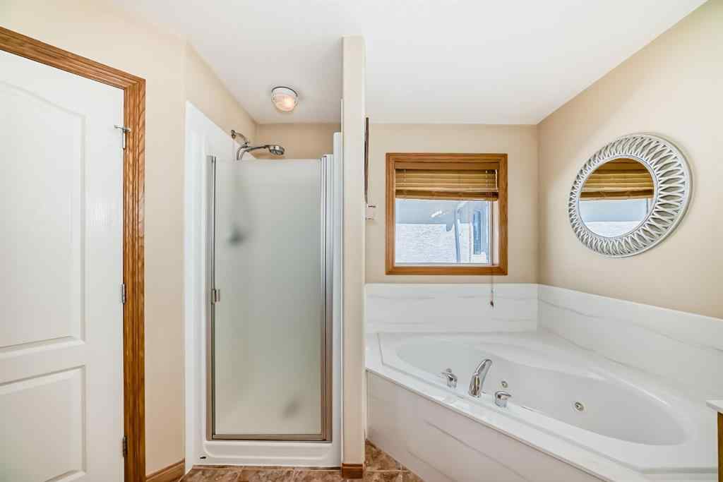 MLS® A2252175 - 42 West Cedar Point SW in West Springs Calgary, Residential