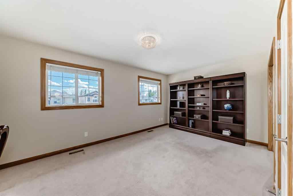 MLS® A2252175 - 42 West Cedar Point SW in West Springs Calgary, Residential