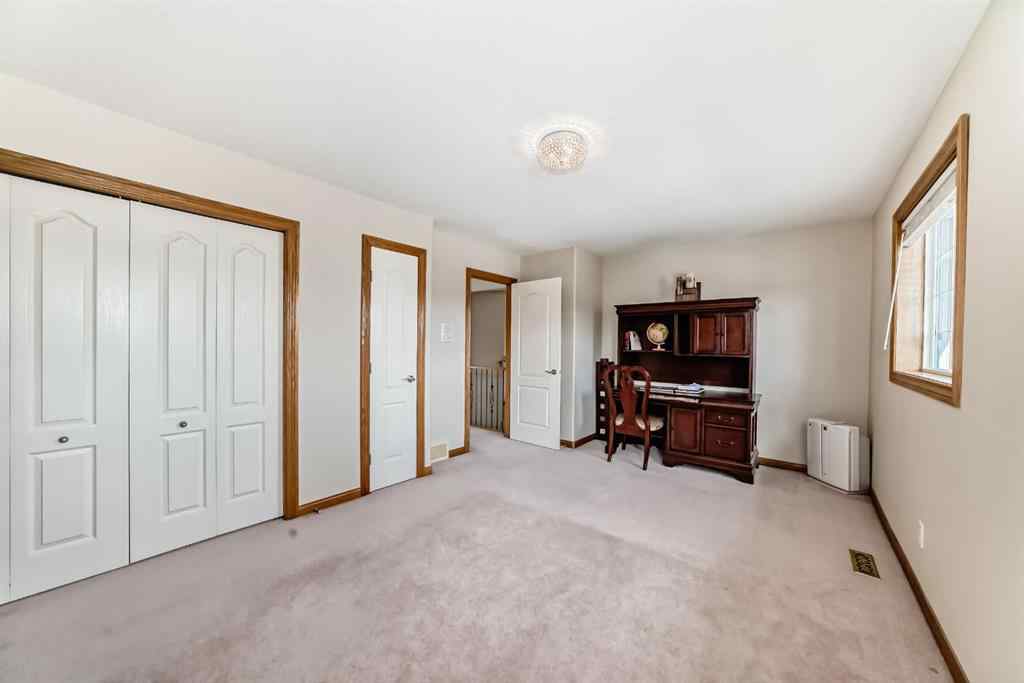 MLS® A2252175 - 42 West Cedar Point SW in West Springs Calgary, Residential