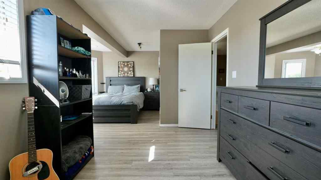 MLS® A2252200 - 10325 83 Street  in Saddleback Ridge Peace River, Residential