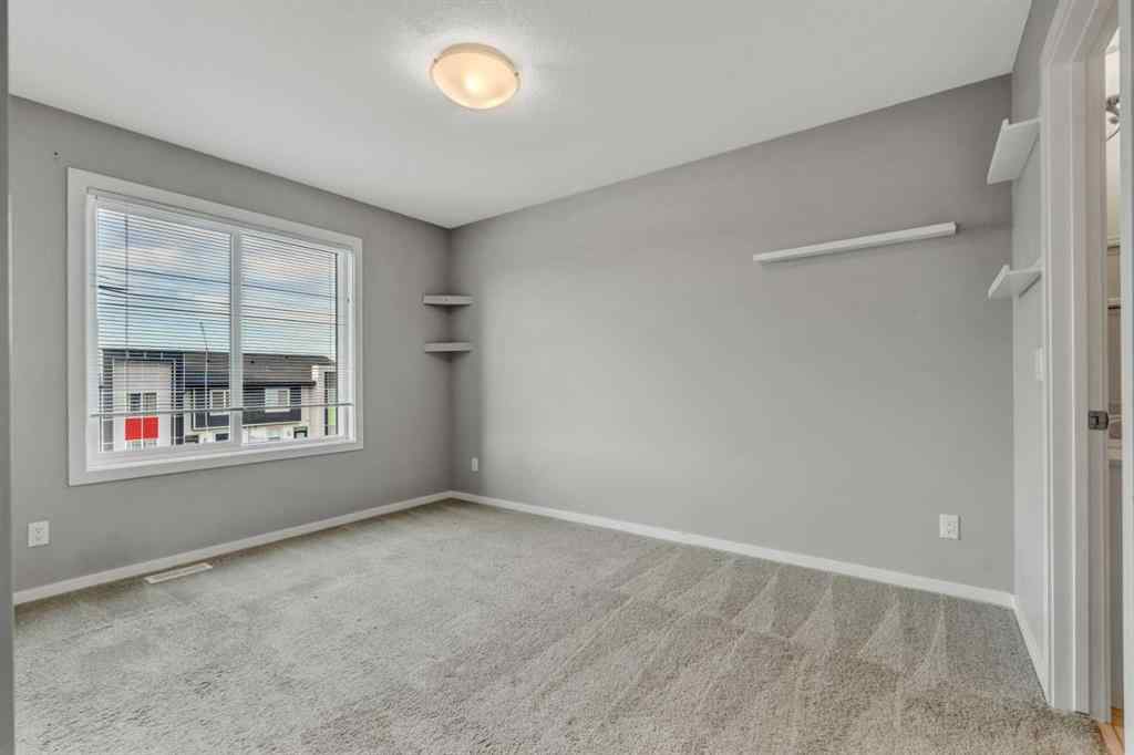 MLS® A2252260 - Unit #203 140 Redstone Walk NE in Redstone Calgary, Residential