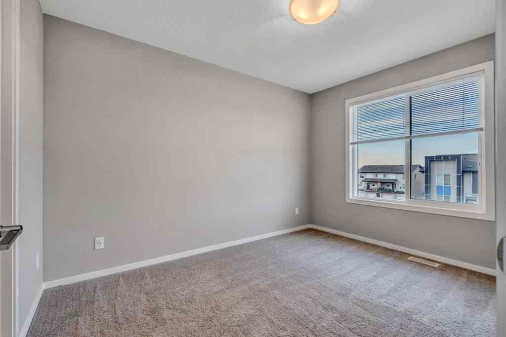 MLS® A2252260 - Unit #203 140 Redstone Walk NE in Redstone Calgary, Residential