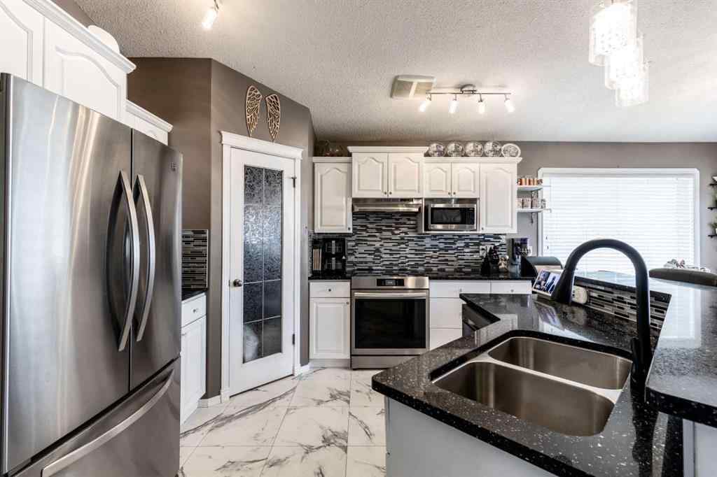 MLS® A2252275 - 310 Jesmond Drive SW in NONE Redcliff, Residential