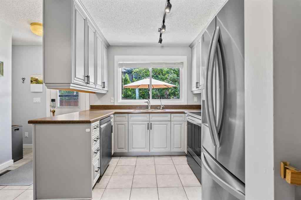 MLS® A2252317 - 16 Deer Ridge Court SE in Deer Ridge Calgary, Residential