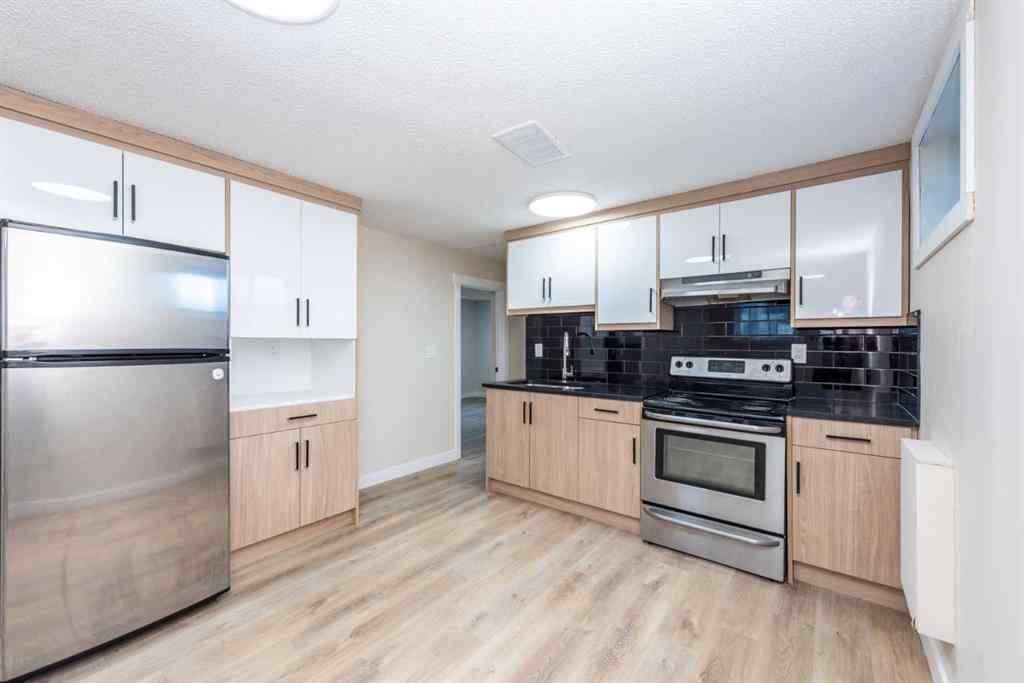 MLS® A2252354 - 209 47 Street SE in Forest Heights Calgary, Residential