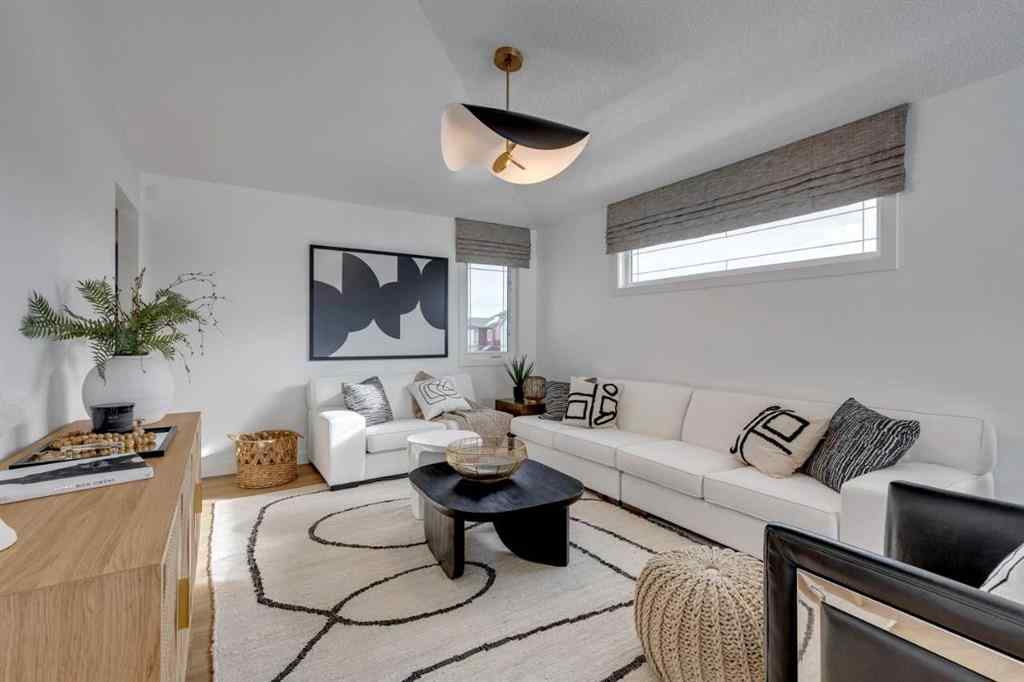 MLS® A2252361 - 401 Sora Way SE in Hotchkiss Calgary, Residential
