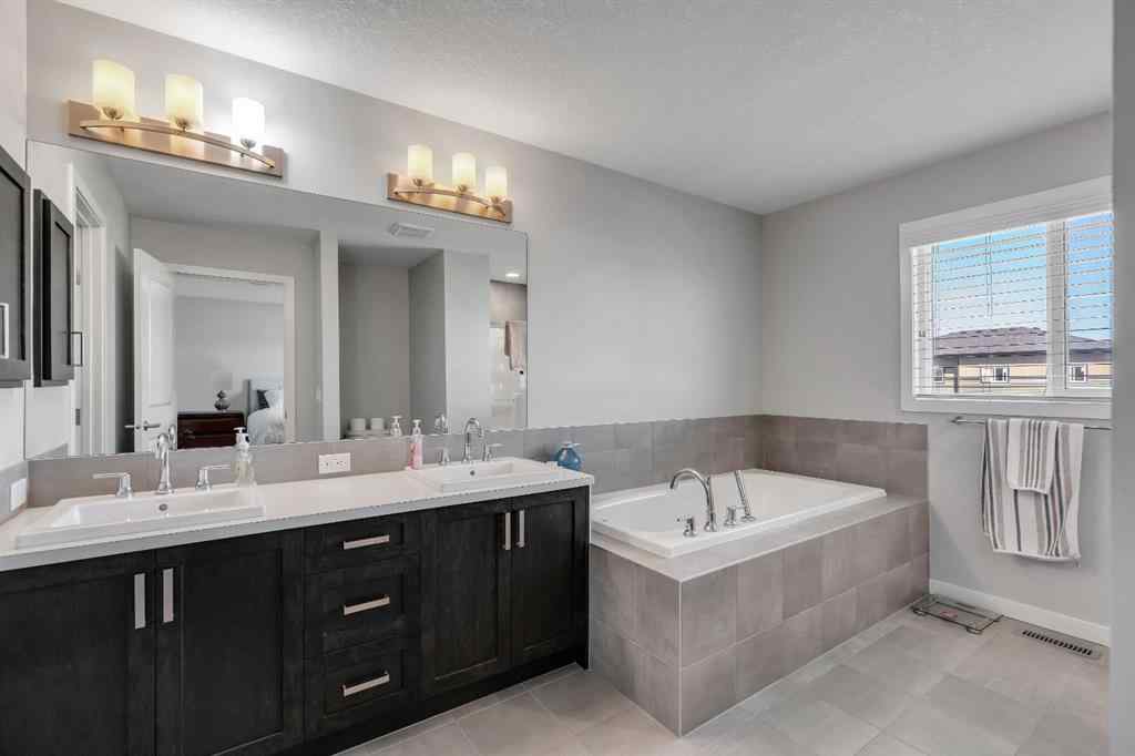 MLS® A2252362 - 128 Midtown Court SW in Midtown Airdrie, Residential