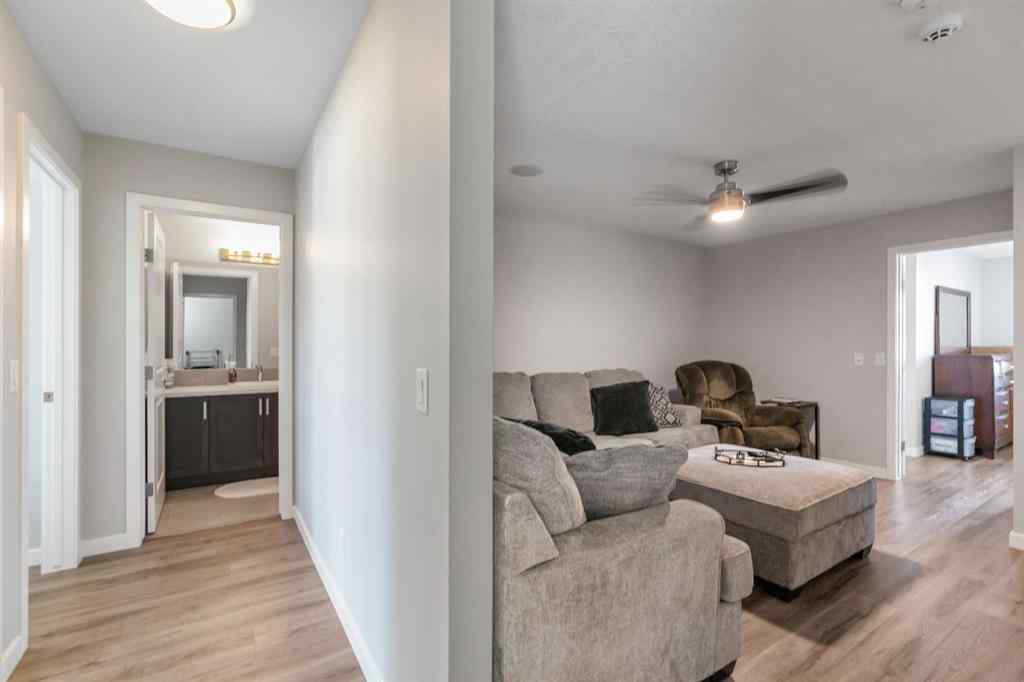 MLS® A2252362 - 128 Midtown Court SW in Midtown Airdrie, Residential