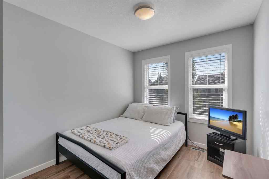 MLS® A2252362 - 128 Midtown Court SW in Midtown Airdrie, Residential