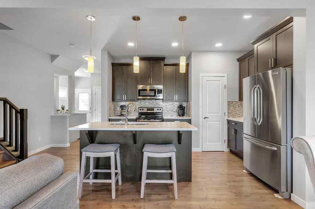 MLS® A2252362 - 128 Midtown Court SW in Midtown Airdrie, Residential