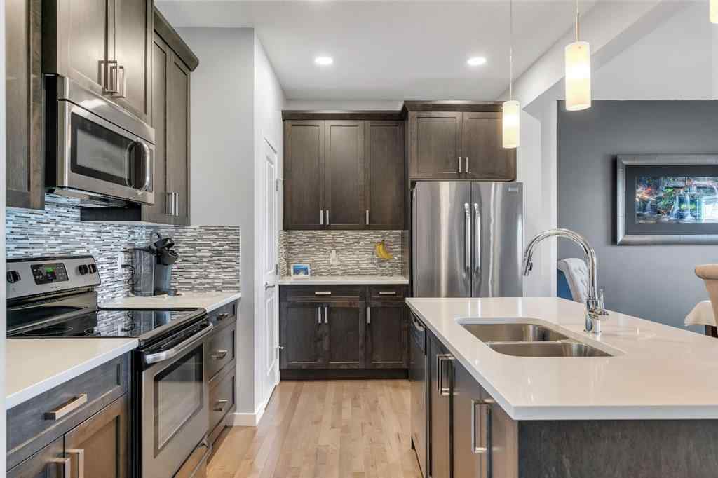 MLS® A2252362 - 128 Midtown Court SW in Midtown Airdrie, Residential