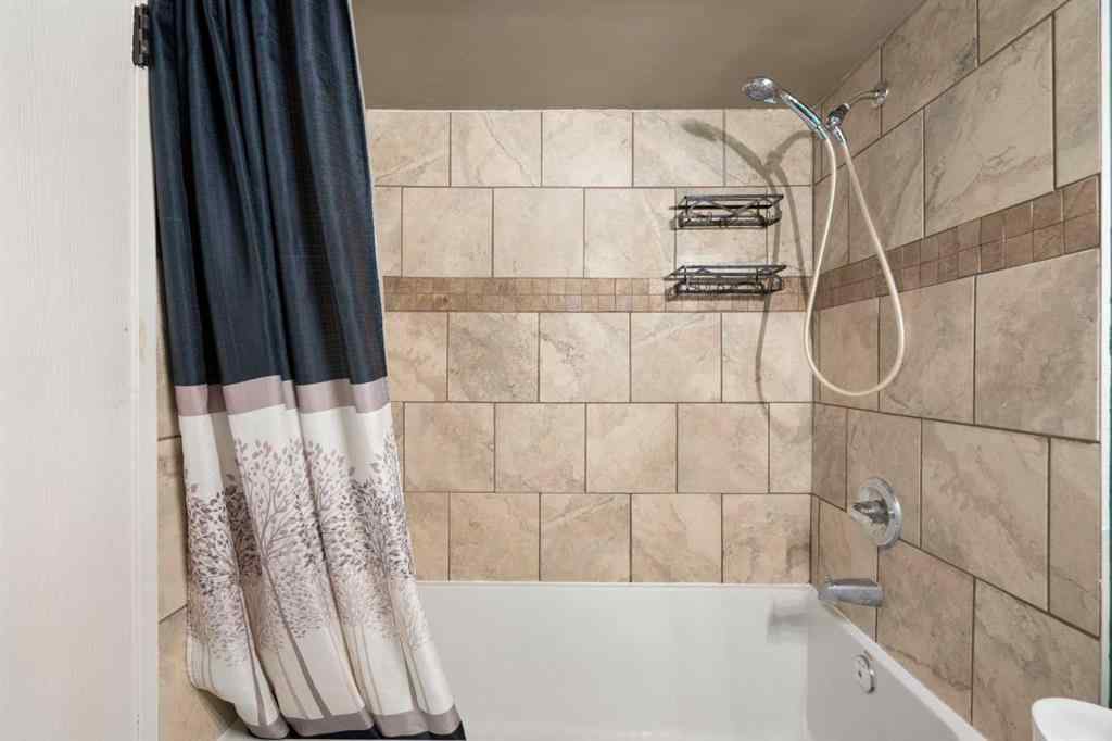 MLS® A2252386 - Unit #103 11010 Bonaventure Drive SE in Willow Park Calgary, Residential