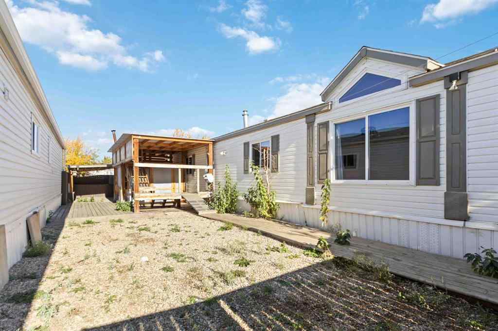 MLS® A2252399 - 215 Grant Way  in Gregoire Park Fort McMurray, Residential