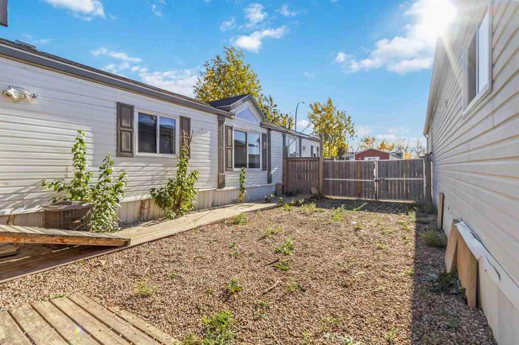 MLS® A2252399 - 215 Grant Way  in Gregoire Park Fort McMurray, Residential